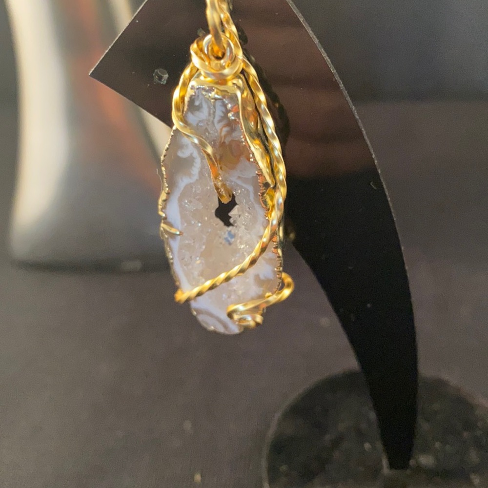 Wired wrapped sliced Quartz pendant